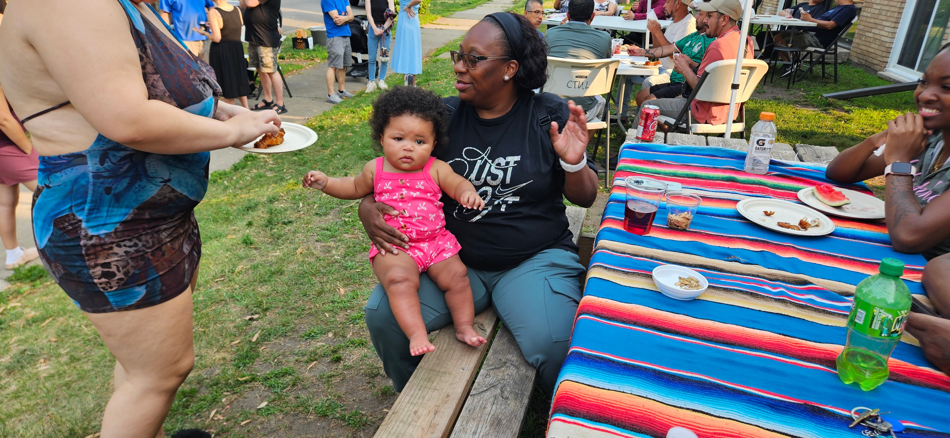  Chloe Jackson and her granddaughter enjoying a picnic at the cooperative.